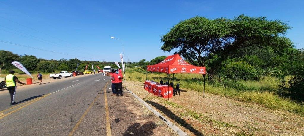 Kazungula Bridge Marathon Halfway Toyota water stand